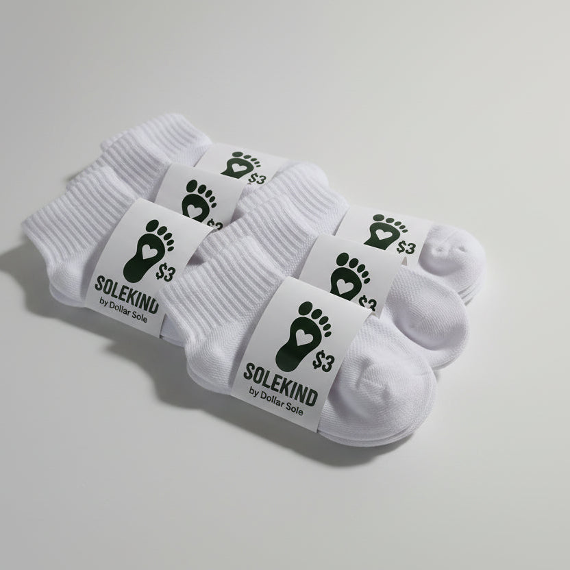 Children’s white ankle socks by Dollar Sole, $3 Buy One Give One